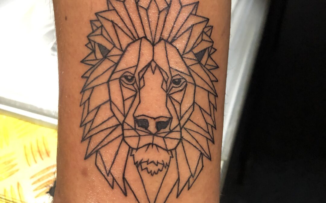 tête de lion en origami sur cheville